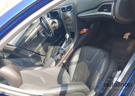 2016 Ford Fusion Energi Titanium z USA, uszkodzony, nr VIN 3FA6P0SU5GR283694